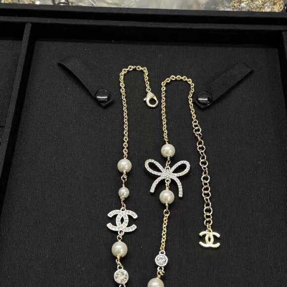 Authentic CHANEL Pearl CC Logo & Crystal Bow Station Necklace - Picture 2 of 6